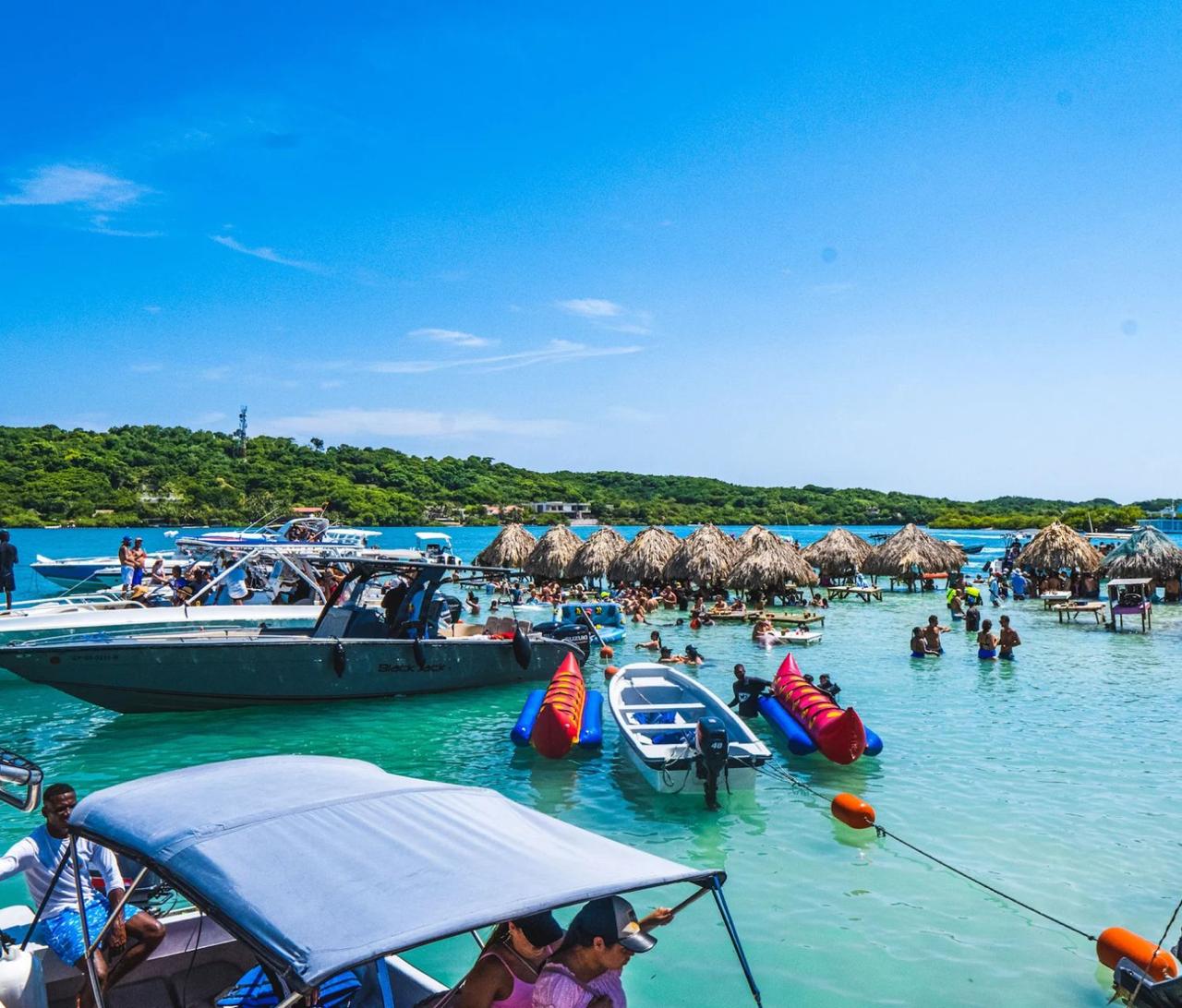 A wide shot of the boat party scene in Cholon, Colombia.