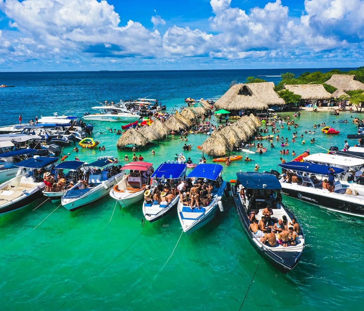 People dancing and enjoying the music on the boats in Cholón.